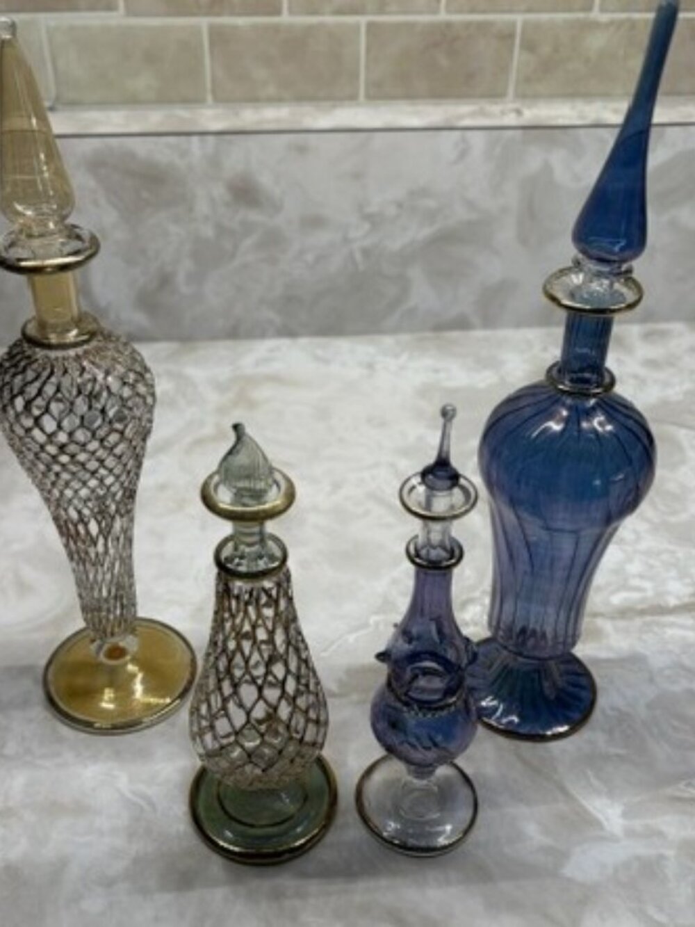 4 Eyptain Perfume bottles
